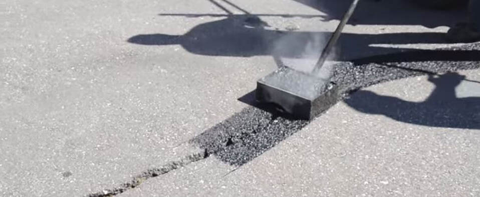 Driveway Crack Repair with Hot Asphalt Mix NH Paving Pros Nashua